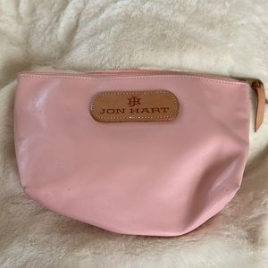 Light pink Jon Hart cosmetic bag like new condition with one very tiny stain